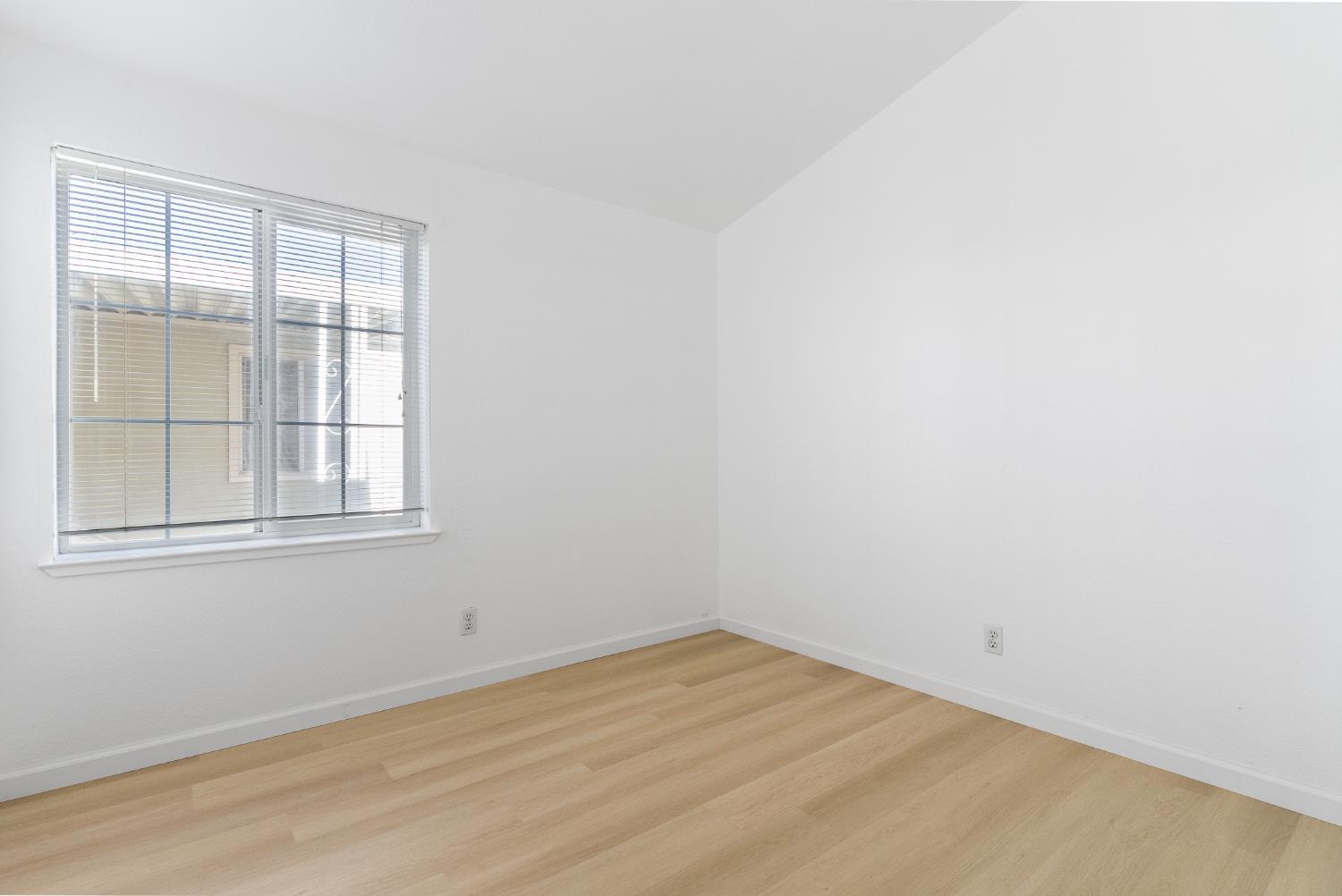 200 Ford Road, Unit 227 San Jose, CA 95138 - Photo 19 of 37 an empty room with a window