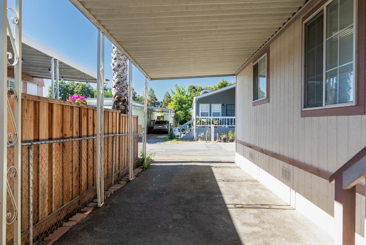 200 Ford Road, Unit 227 San Jose, CA 95138 - Photo 34 of 37 a view of a balcony with wooden fence