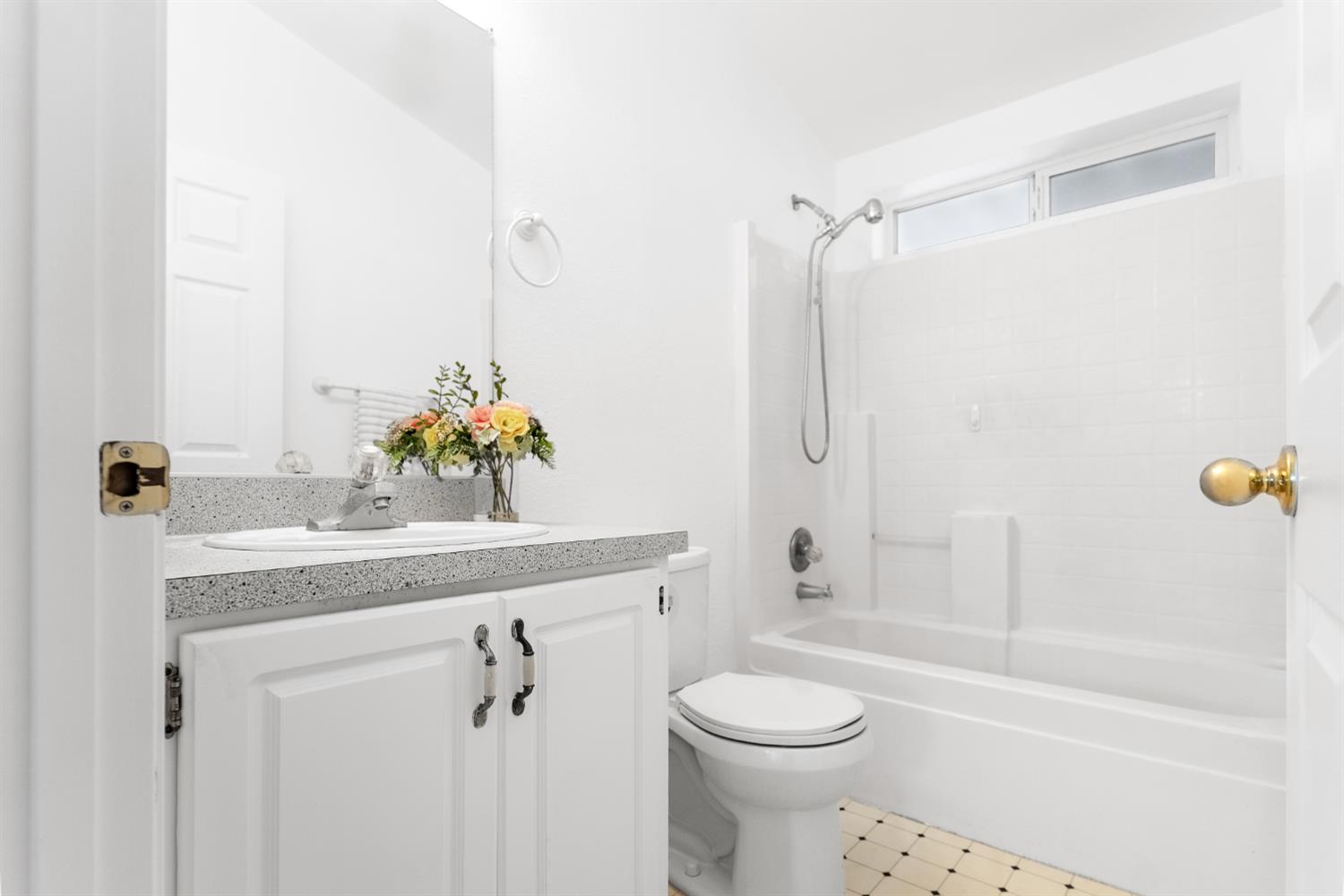 200 Ford Road, Unit 227 San Jose, CA 95138 - Photo 7 of 37 a bathroom with a granite countertop sink a toilet and shower