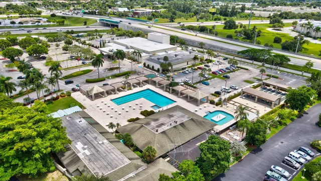 an aerial view of a swimming pool patio and mountain view