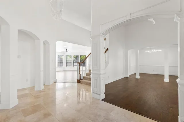 a view of a big room with windows