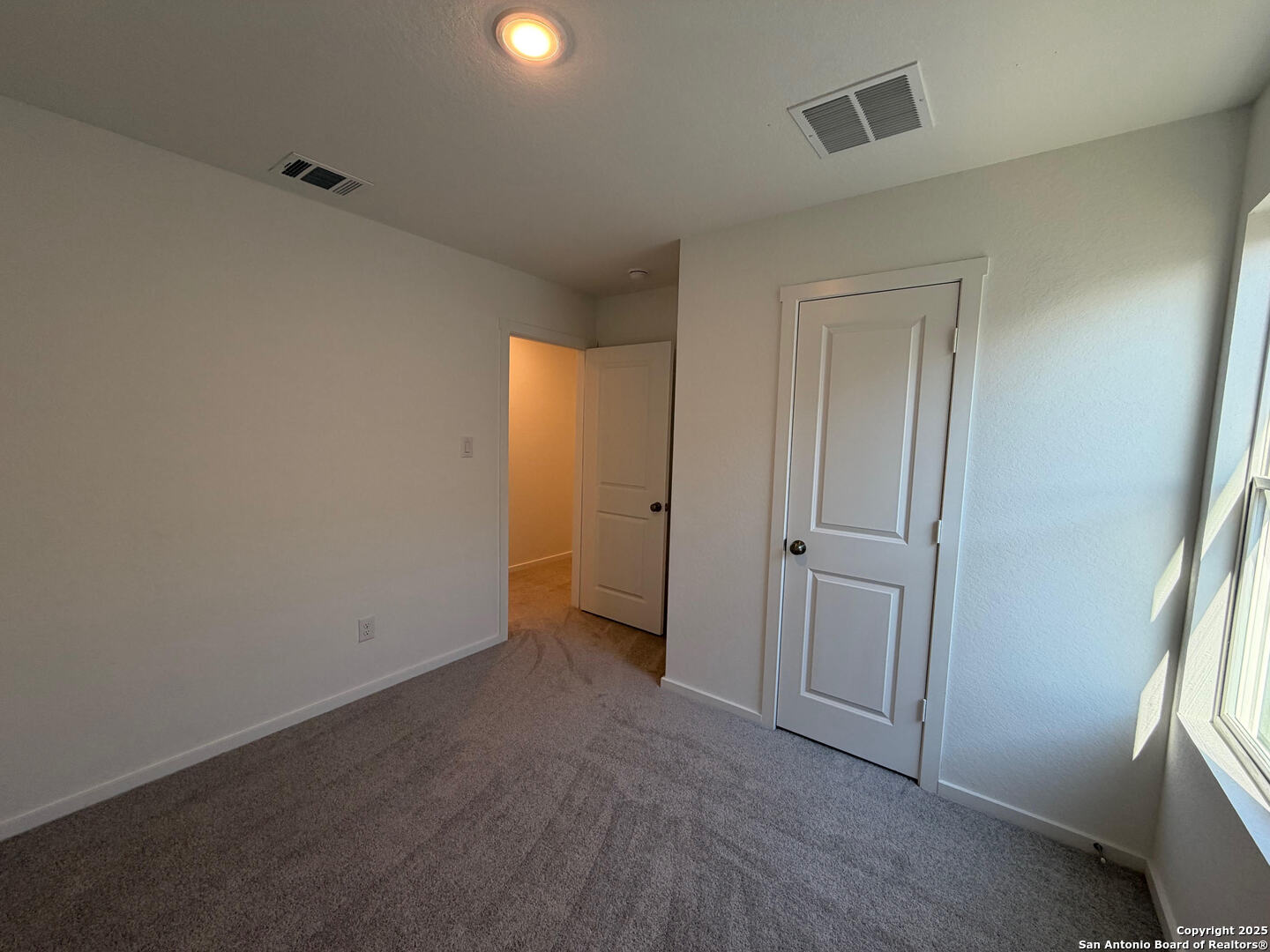11910 Bluebell Ridge Converse, TX 78109 - Photo 13 of 15 a view of an empty room