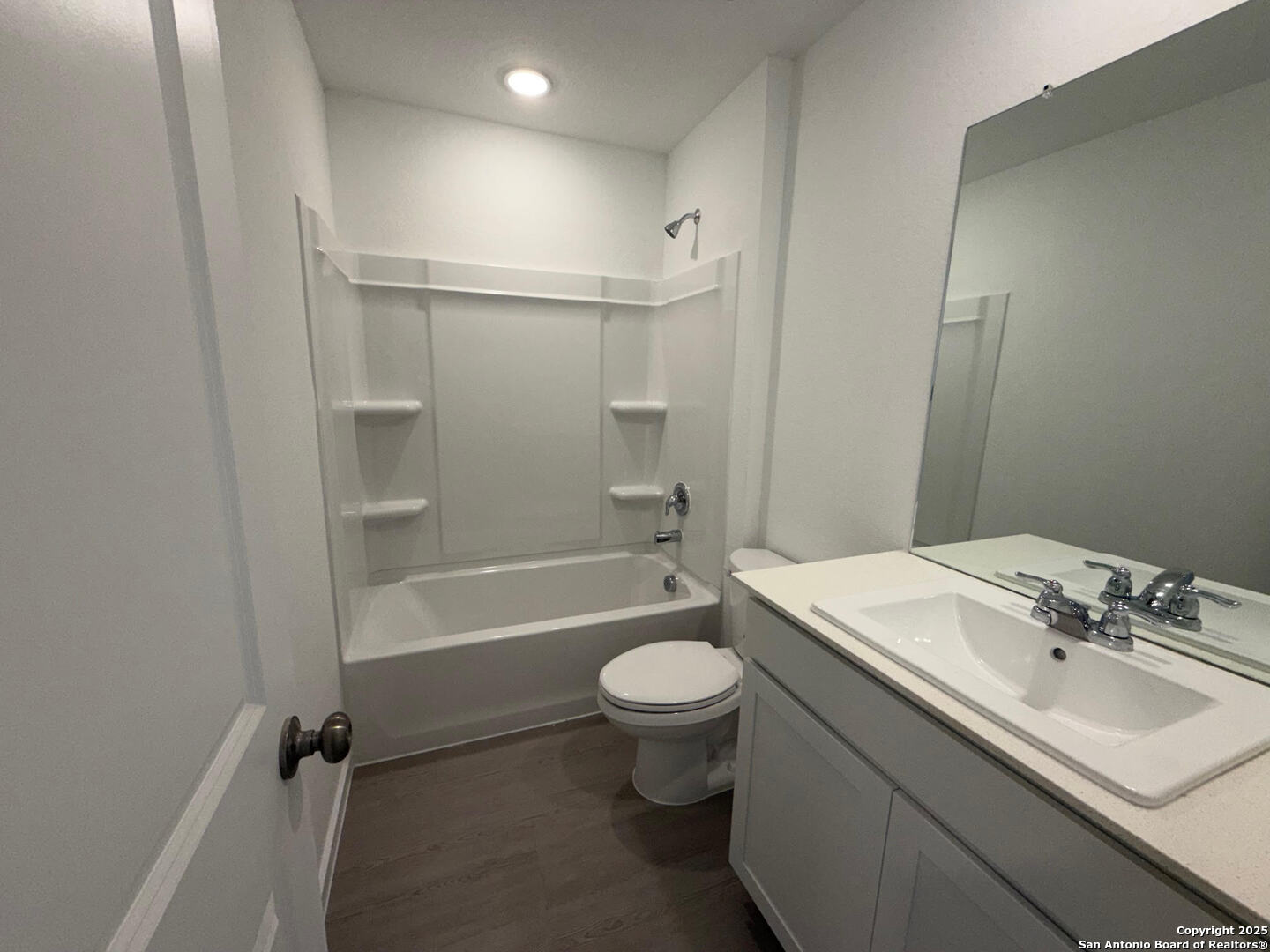 11910 Bluebell Ridge Converse, TX 78109 - Photo 14 of 15 a bathroom with a sink a toilet and shower
