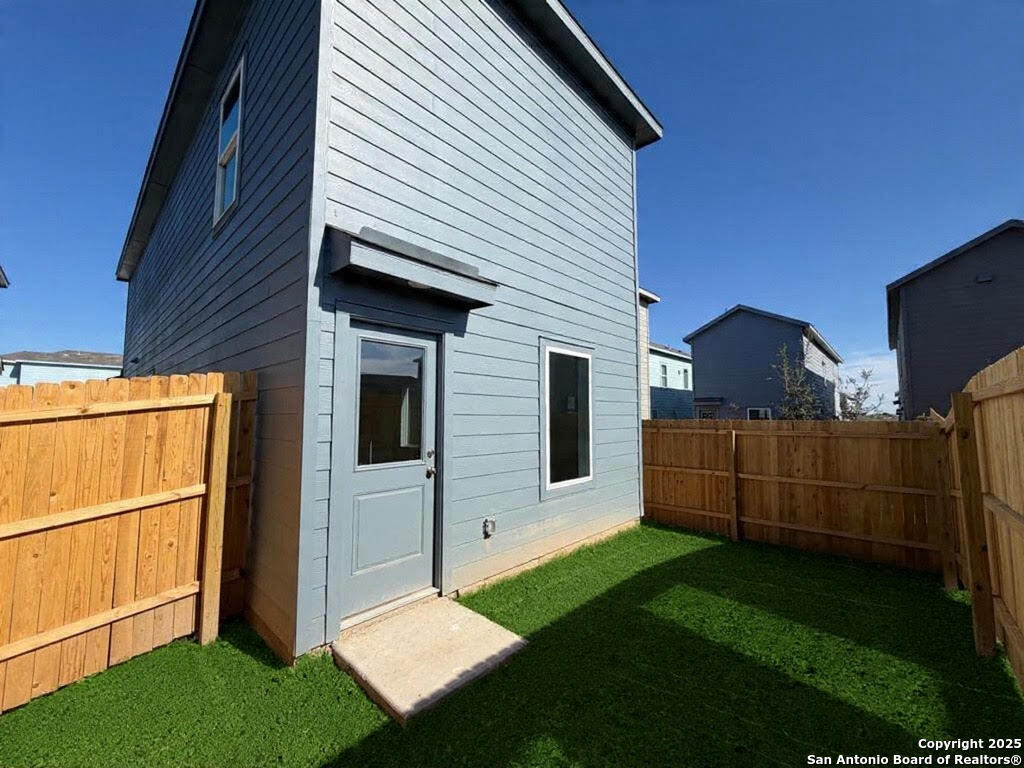 11910 Bluebell Ridge Converse, TX 78109 - Photo 15 of 15 a view of backyard with cabin