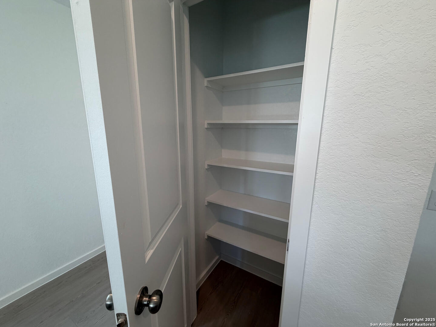 11910 Bluebell Ridge Converse, TX 78109 - Photo 5 of 15 a view of an empty walk in closet