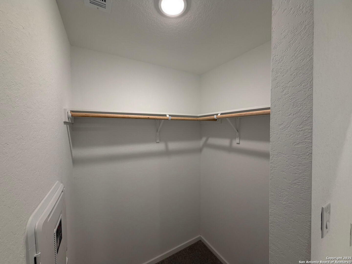 11910 Bluebell Ridge Converse, TX 78109 - Photo 9 of 15 a view of an empty walk in closet