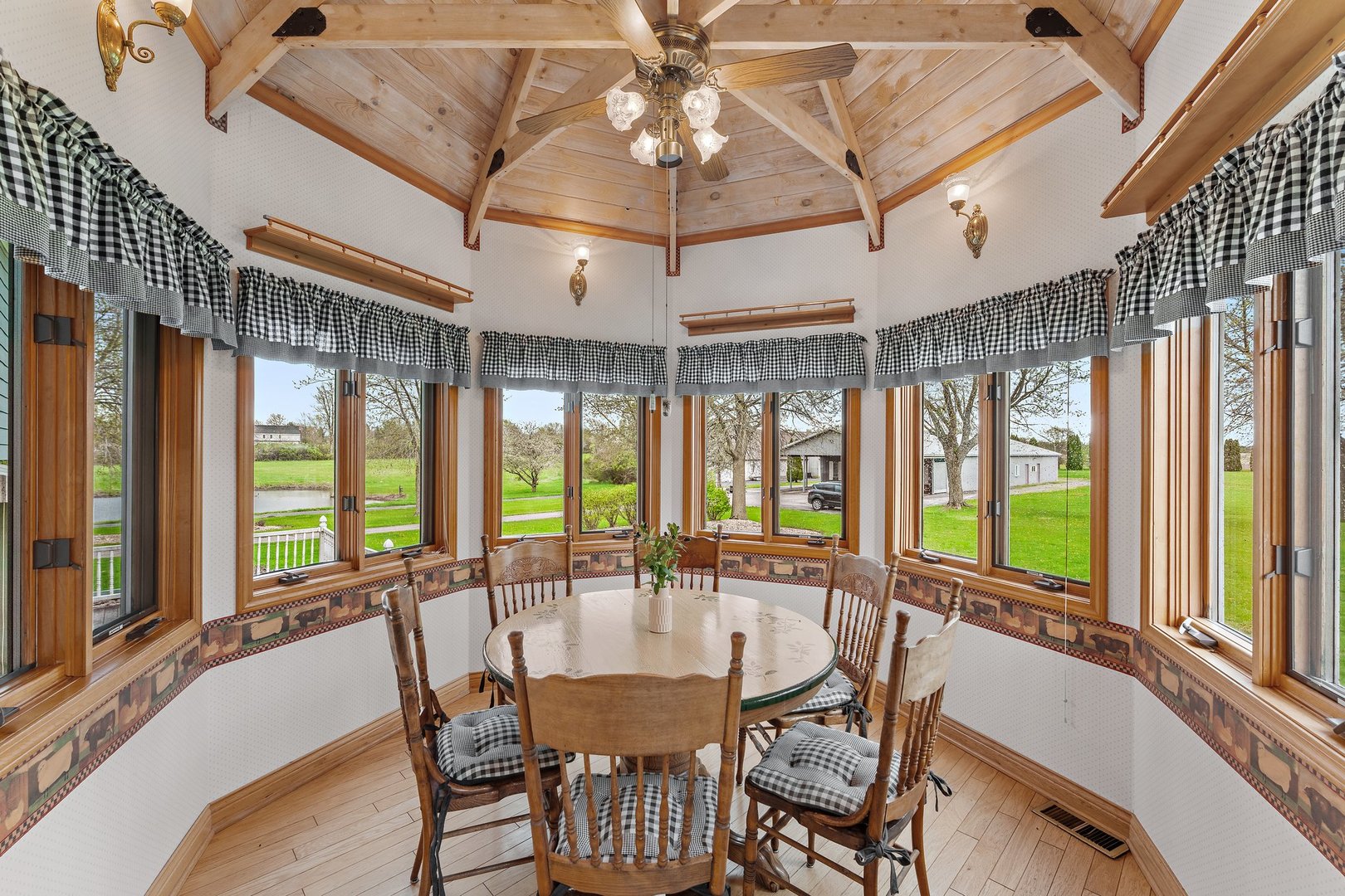 2929 East Danne Road Crete, IL 60417 - Photo 13 of 56 a dining room with furniture a chandelier and wooden floor