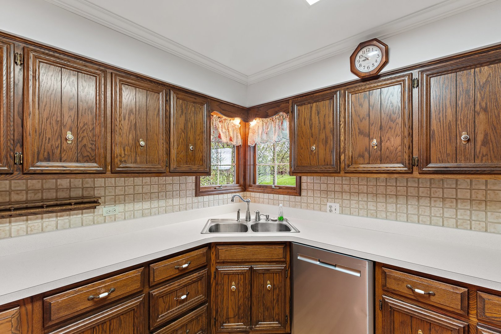 2929 East Danne Road Crete, IL 60417 - Photo 16 of 56 a kitchen with wooden cabinets and a sink