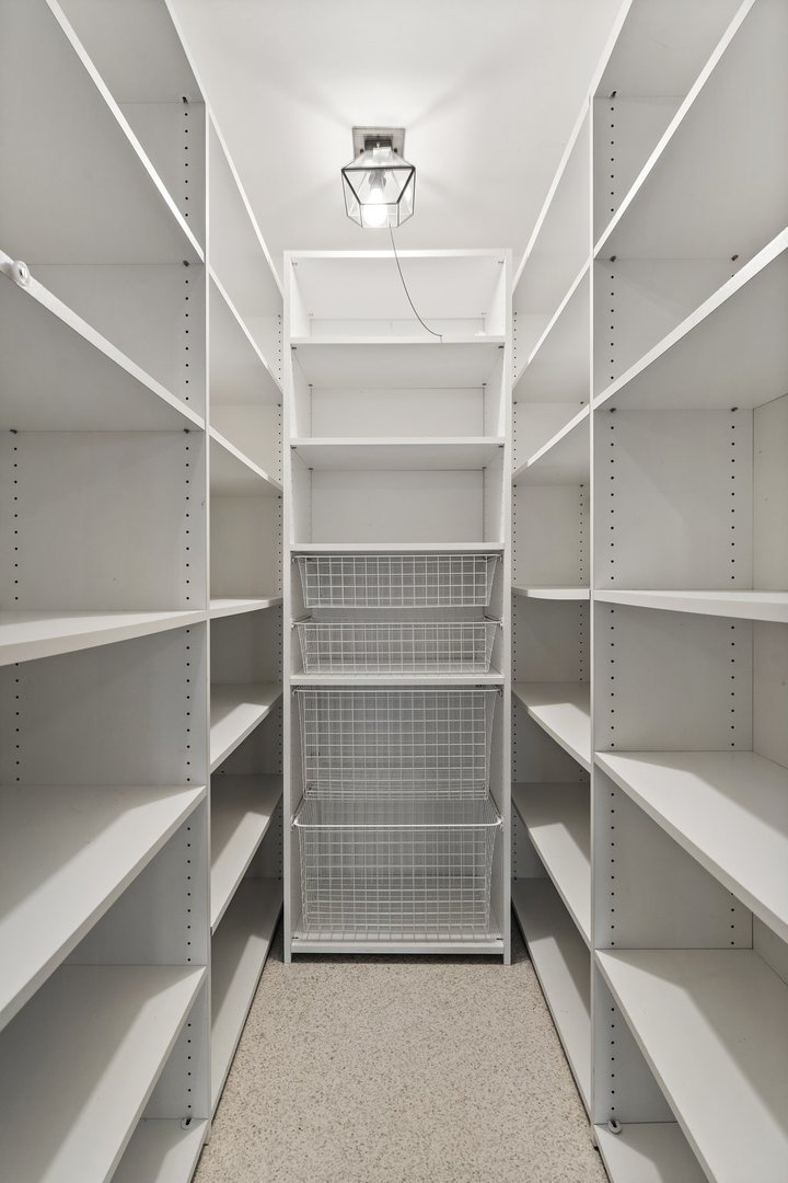 2929 East Danne Road Crete, IL 60417 - Photo 19 of 56 a view of walk in closet with empty racks