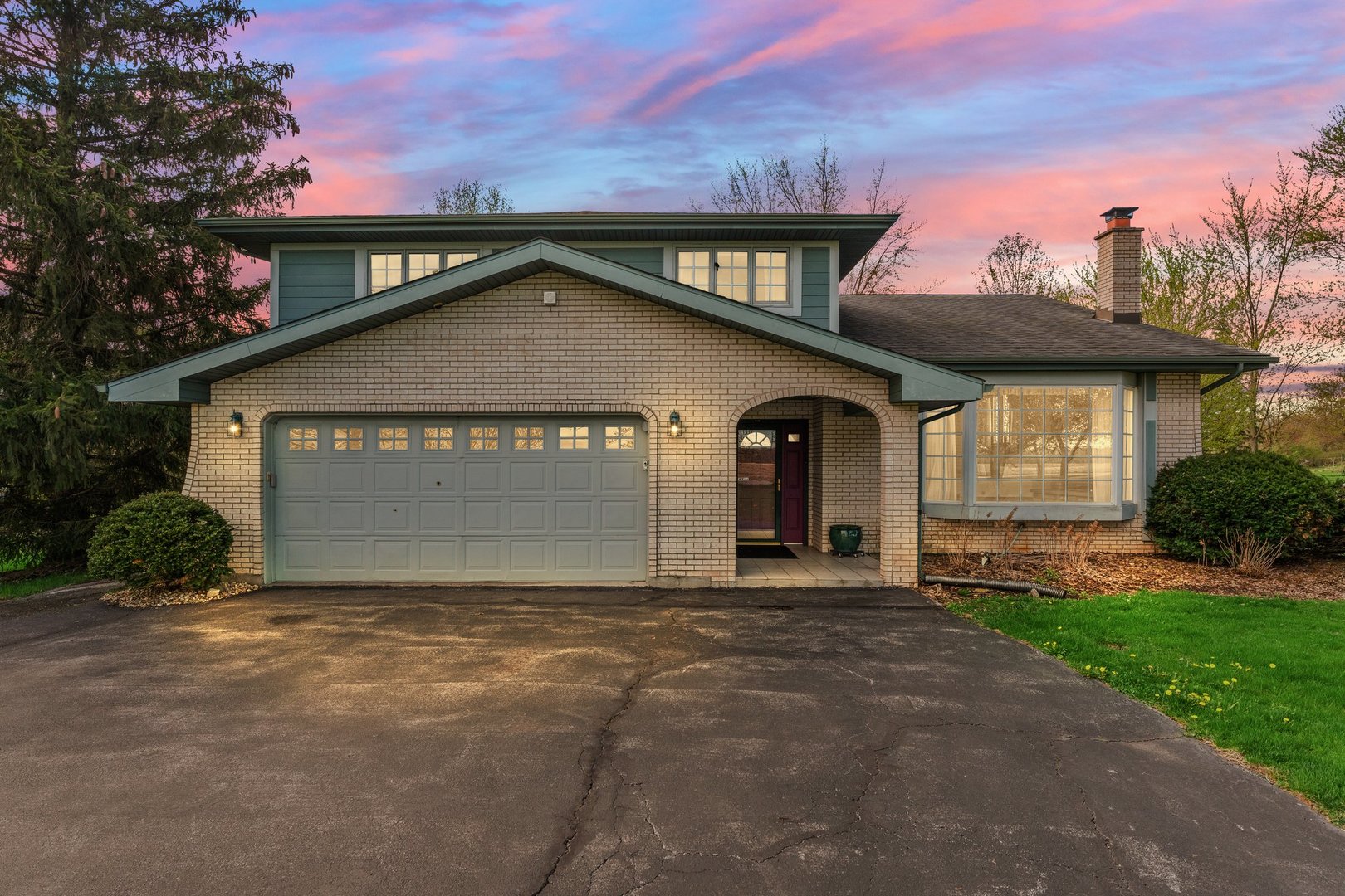 2929 East Danne Road Crete, IL 60417 - Photo 3 of 56 a front view of a house with a yard