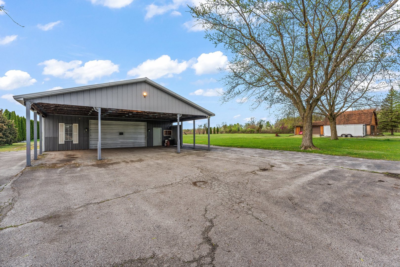 2929 East Danne Road Crete, IL 60417 - Photo 35 of 56 a view of an house with backyard and tree