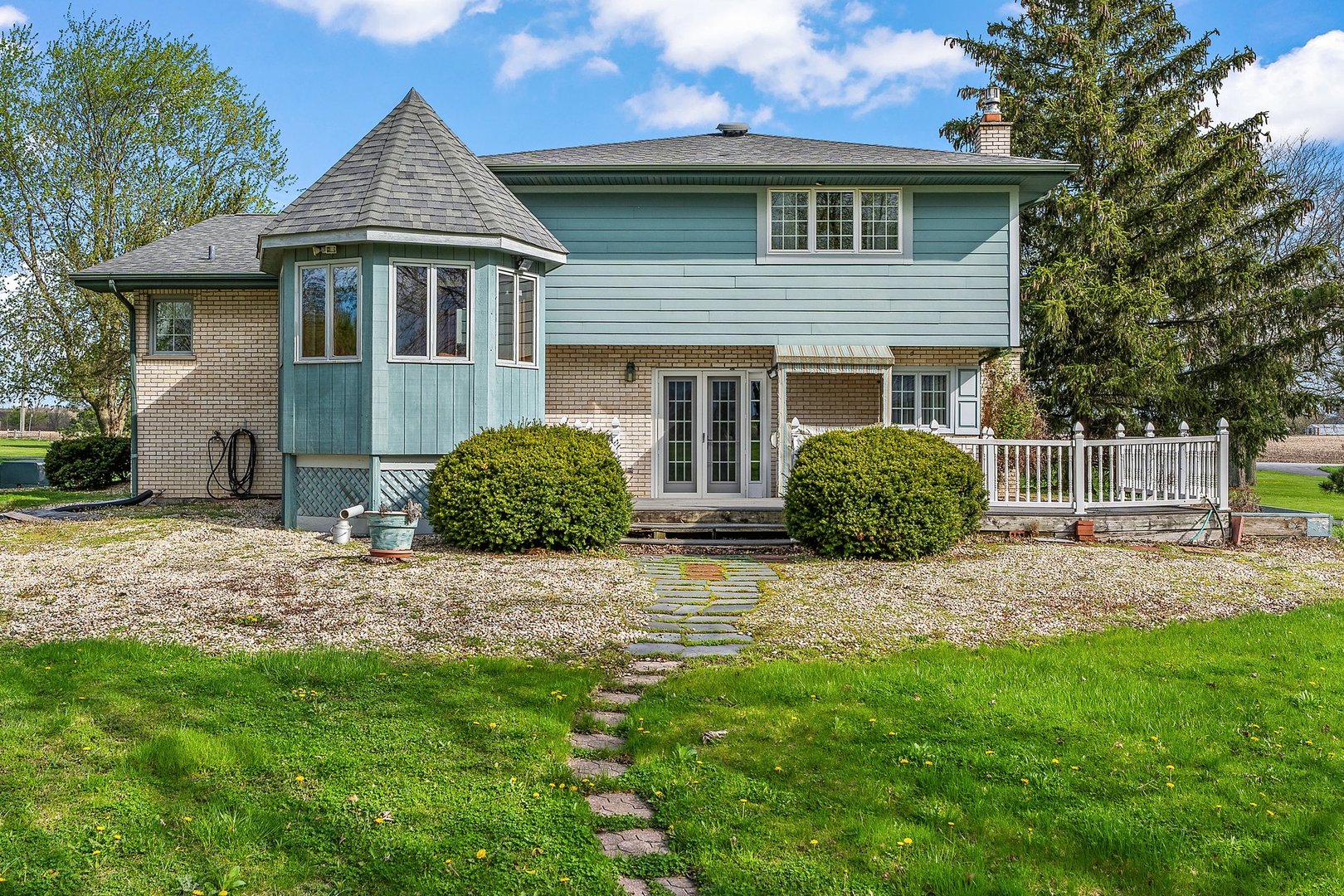 2929 East Danne Road Crete, IL 60417 - Photo 42 of 56 a view of a yard in front of a house with plants and large tree