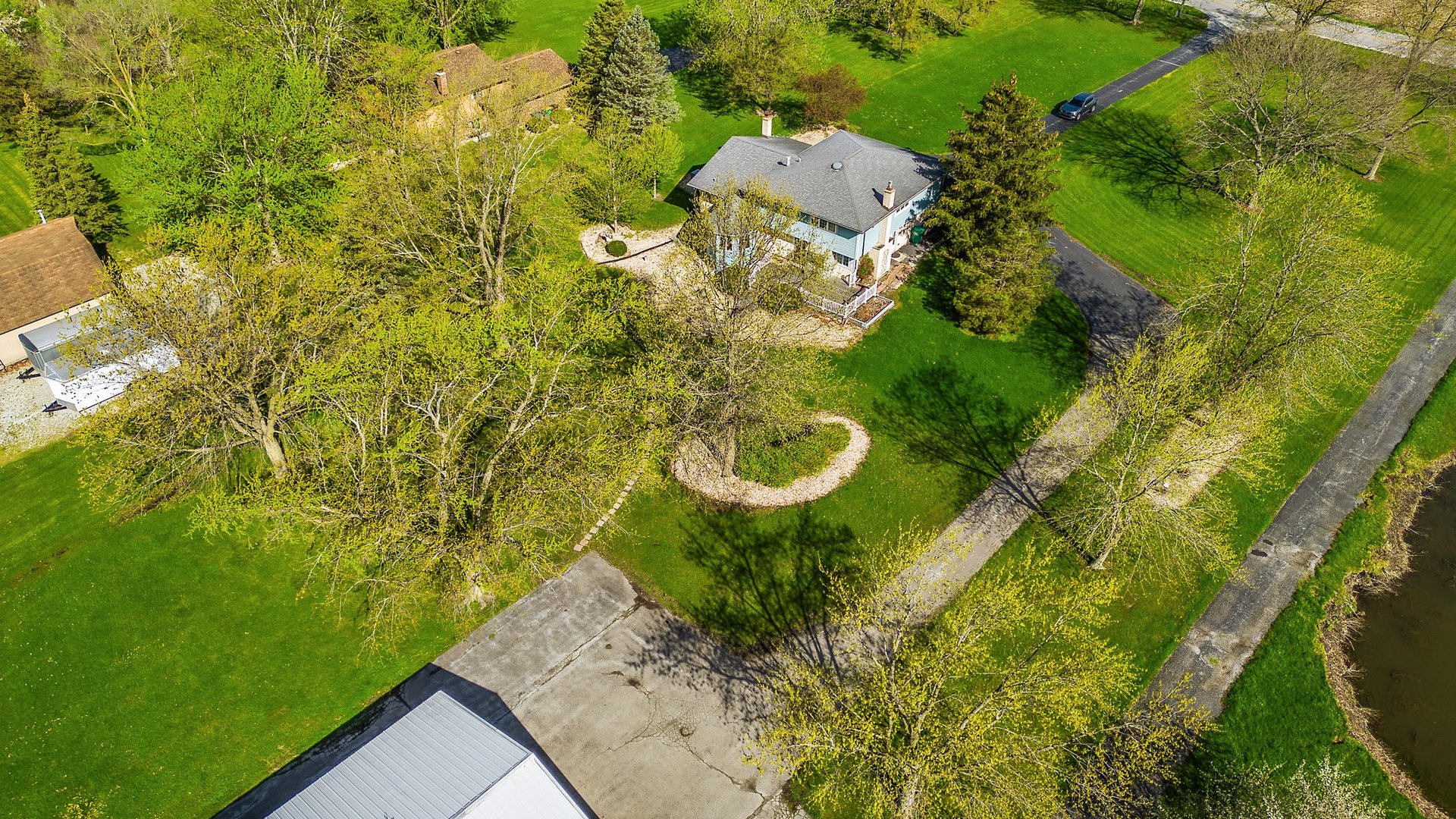 2929 East Danne Road Crete, IL 60417 - Photo 48 of 56 a view of a yard with plants and large trees