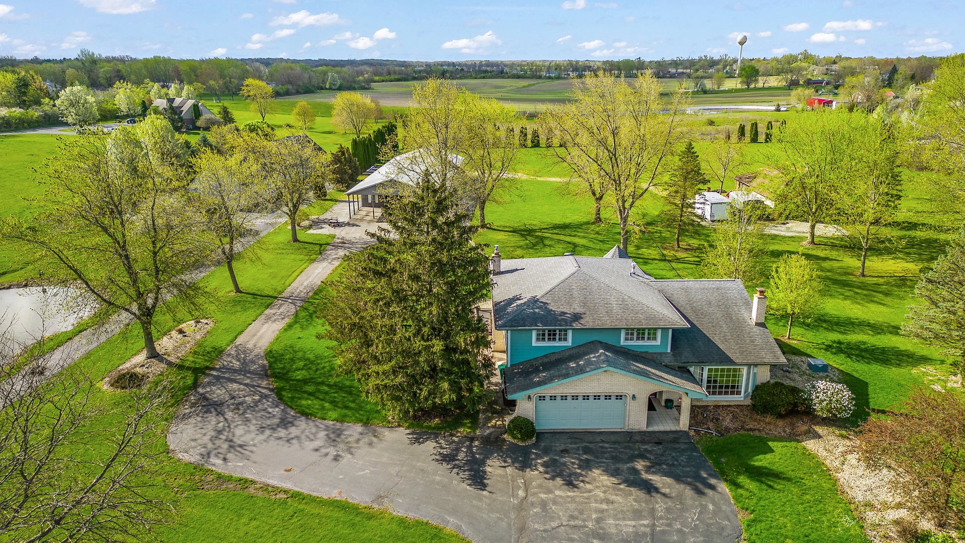 2929 East Danne Road Crete, IL 60417 - Photo 55 of 56 a view of a lake with a building in the background