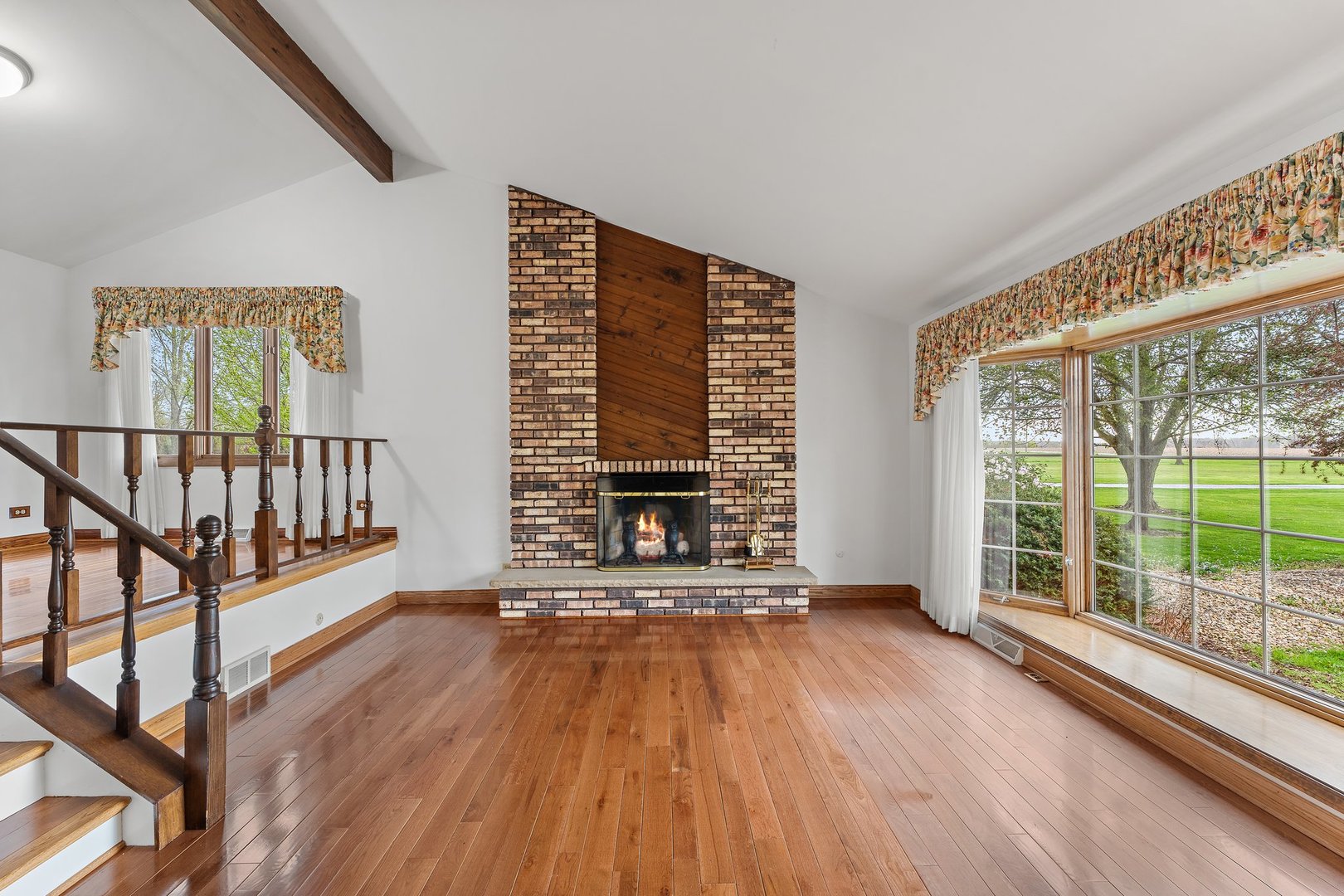 2929 East Danne Road Crete, IL 60417 - Photo 8 of 56 a view of an empty room with wooden floor and a window