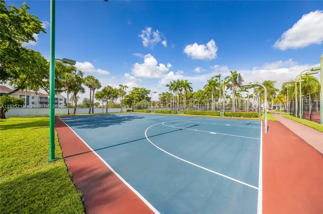 a view of a street with a building in the background