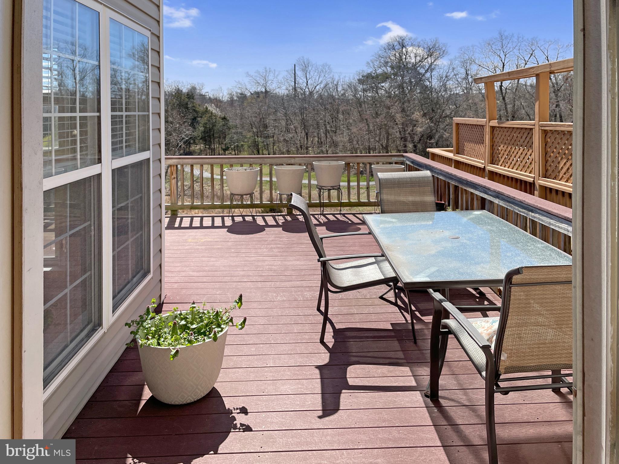 43845 Chadwick Terrace Ashburn, VA 20148 - Photo 1 of 36 a view of a chairs and table on the terrace