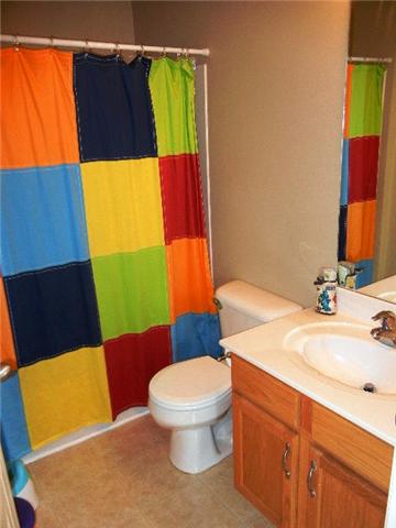 1002 Mallory Lane Spring Hill, TN 37174 - Photo 12 of 20 Second full bath located near the entryway and the secondary bedrooms.
