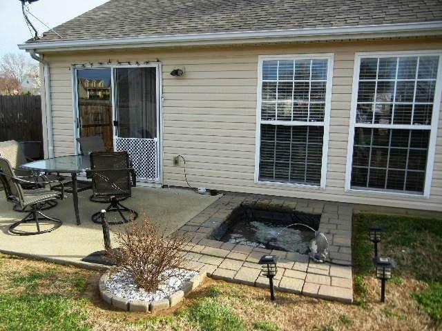 1002 Mallory Lane Spring Hill, TN 37174 - Photo 17 of 20 Peaceful back patio off the dining area.