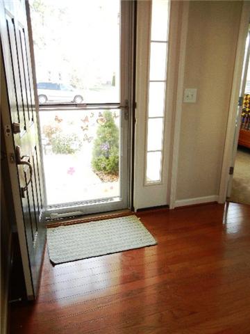1002 Mallory Lane Spring Hill, TN 37174 - Photo 6 of 20 The entryway features an attractive wood floor.