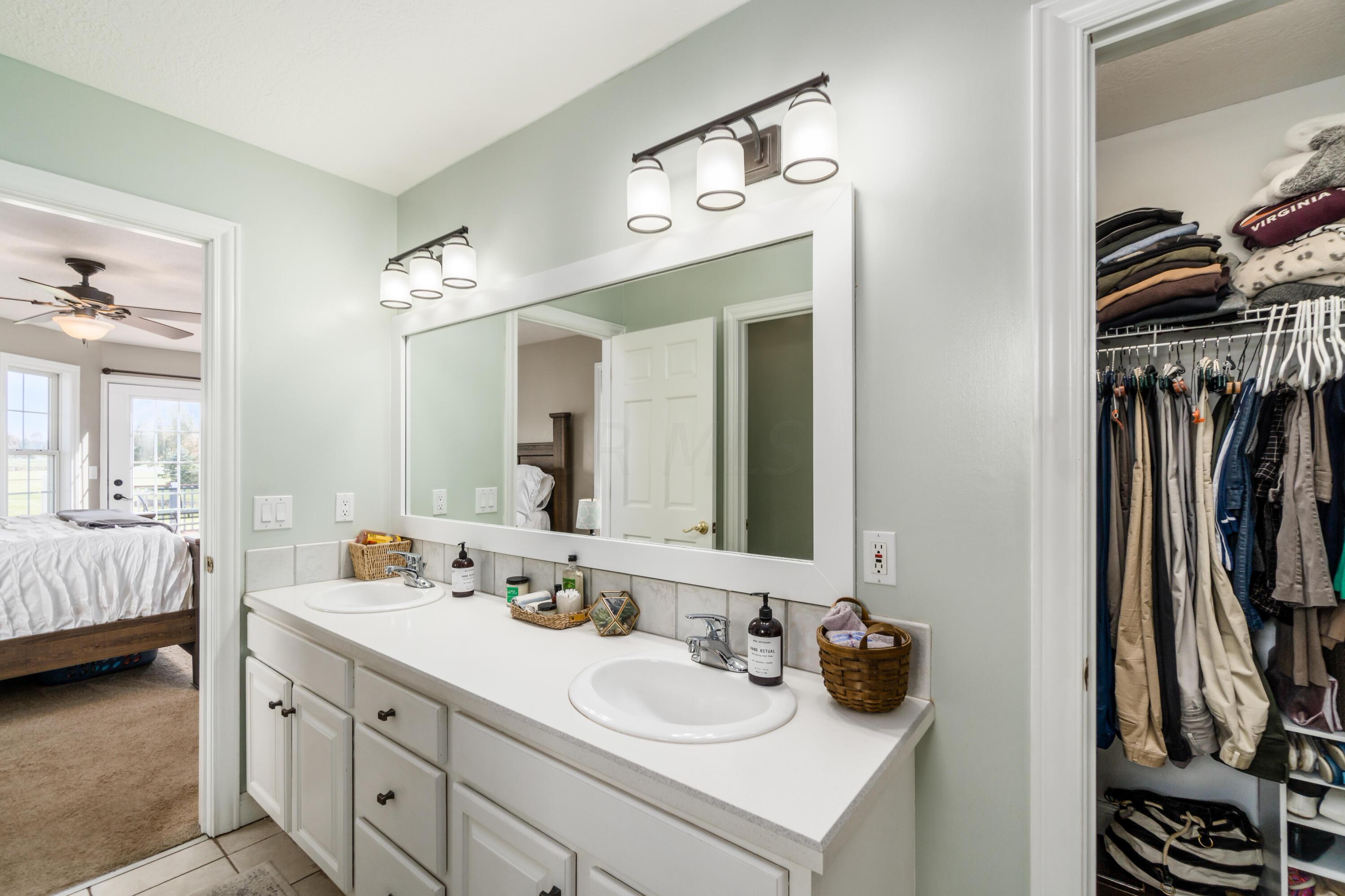 2843 Summit Road Southwest Pataskala, OH 43062 - Photo 21 of 54 Walk-in closet in the master bathroom