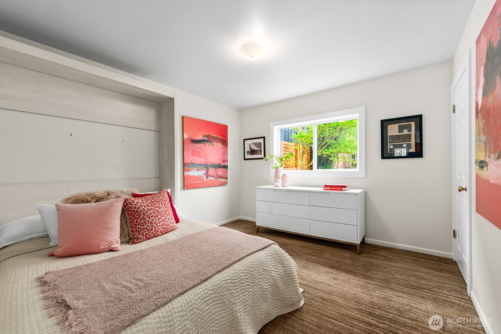 2620 East Roy Street Seattle, WA 98112 - Photo 14 of 27 a bedroom with bed and window