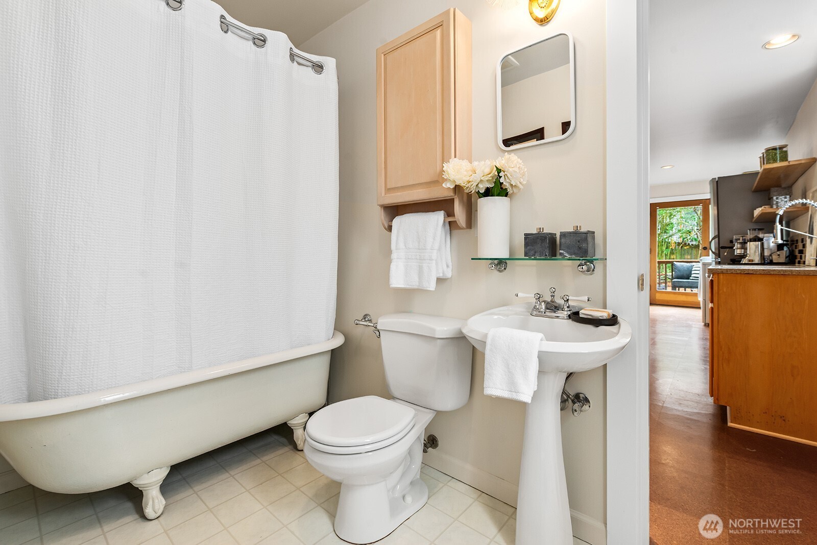 2620 East Roy Street Seattle, WA 98112 - Photo 17 of 27 a bathroom with a sink toilet and shower
