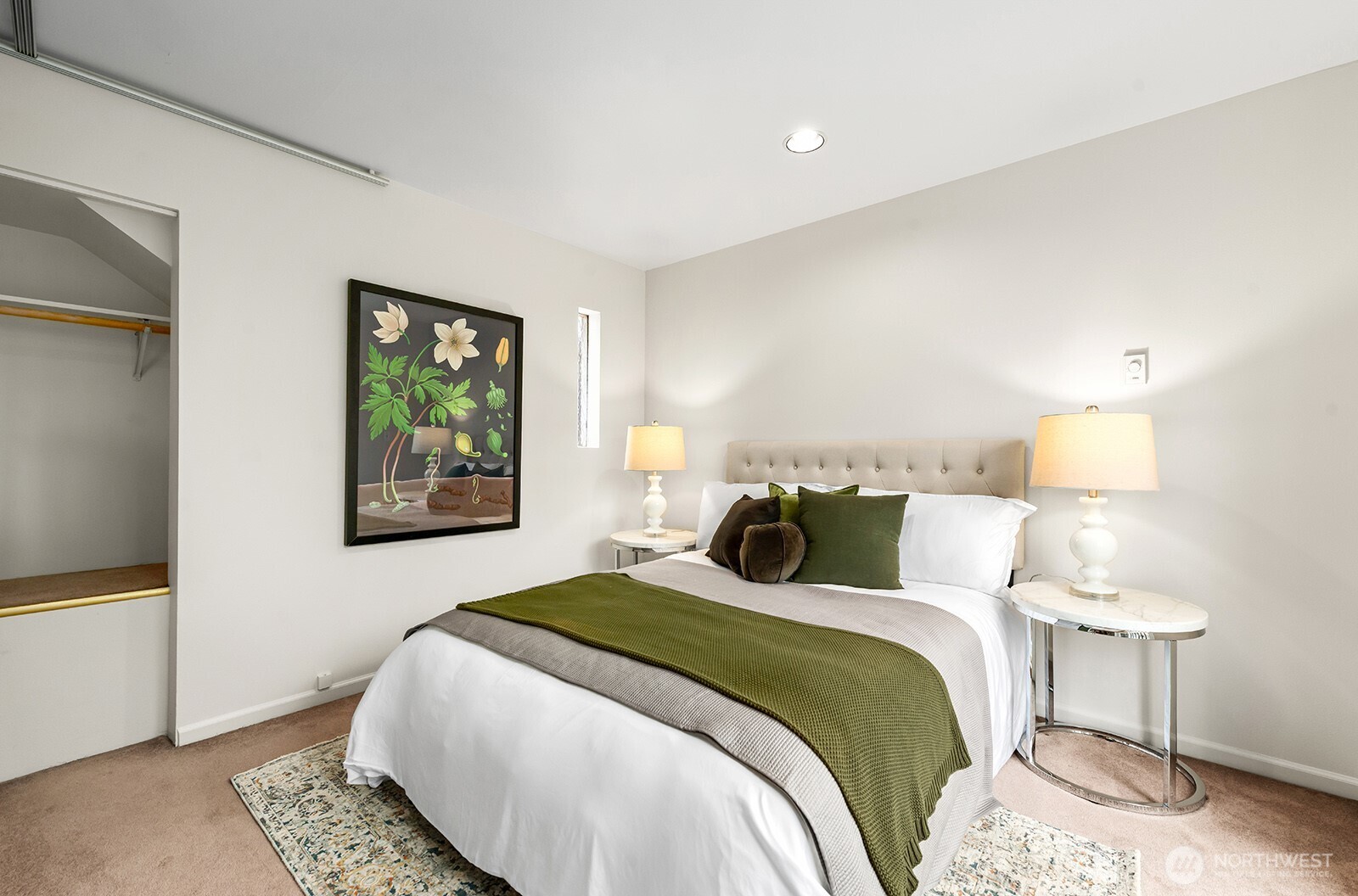 2620 East Roy Street Seattle, WA 98112 - Photo 18 of 27 a bedroom with a bed and a lamp