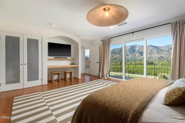 a bathroom with a granite countertop double vanity sinks and a mirror