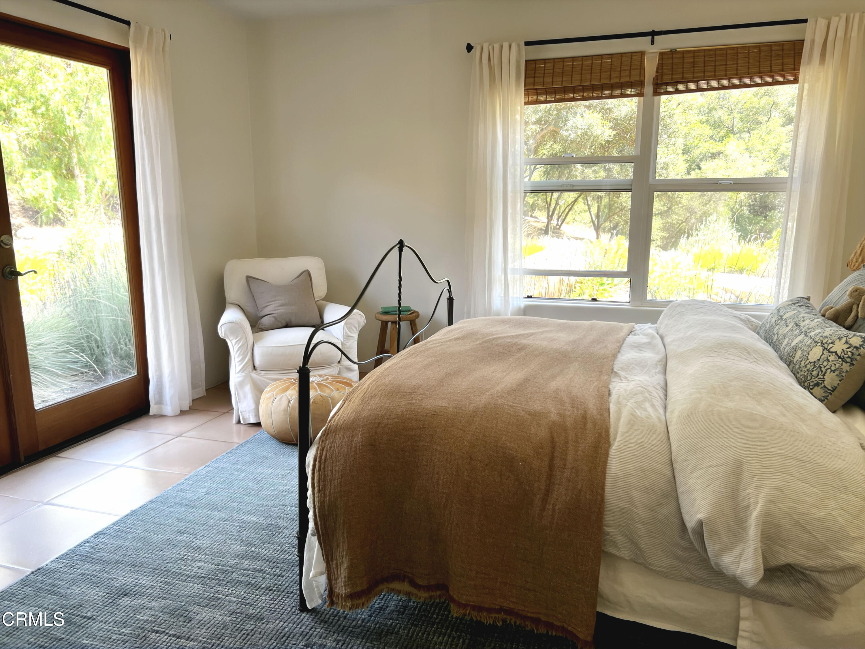 3000 East Ojai Avenue Ojai, CA 93023 - Photo 19 of 34 a bed sitting in a bedroom next to a window