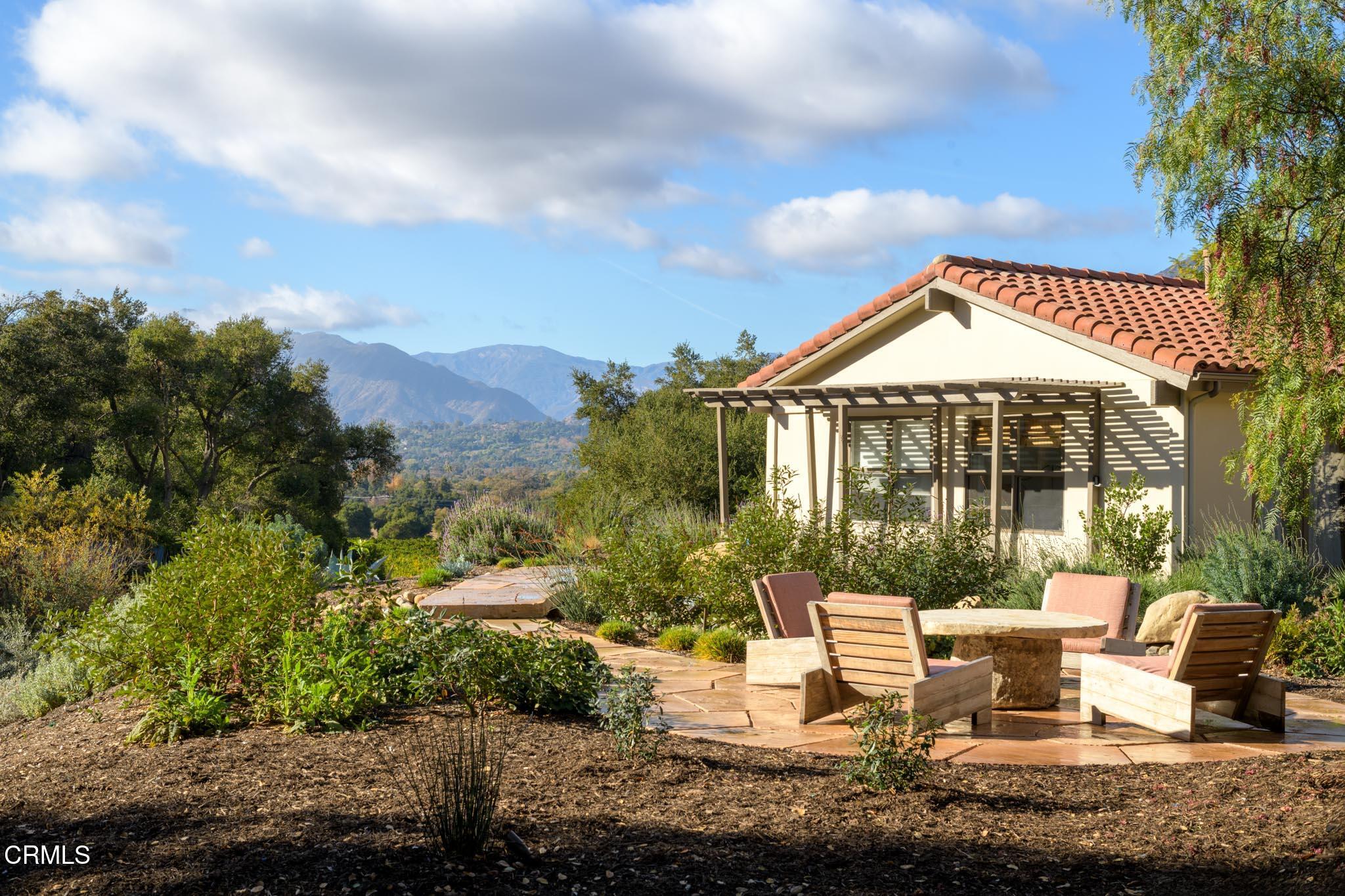 3000 East Ojai Avenue Ojai, CA 93023 - Photo 28 of 34 a view of a patio with couches table and chairs and potted plants