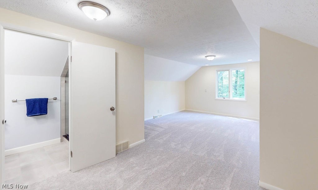 3161 Lander Road Pepper Pike, OH 44124 - Photo 17 of 26 Bedroom upstairs with gray carpet on en-suite bath