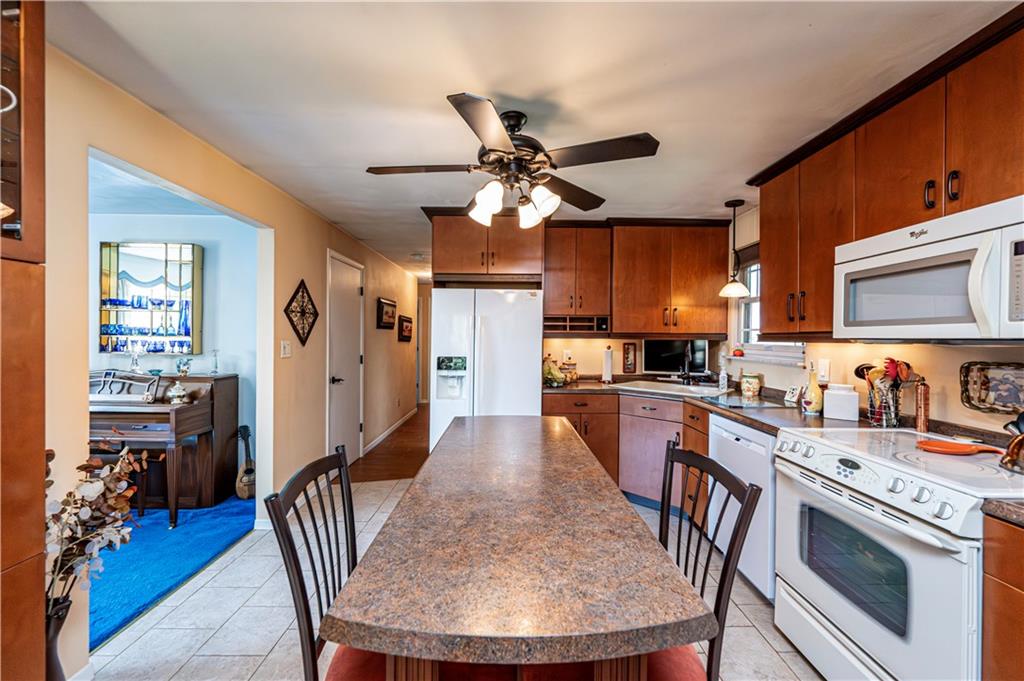 2037 Ridge Road Jeannette, PA 15644 - Photo 8 of 24 a view of kitchen with sink and refrigerator
