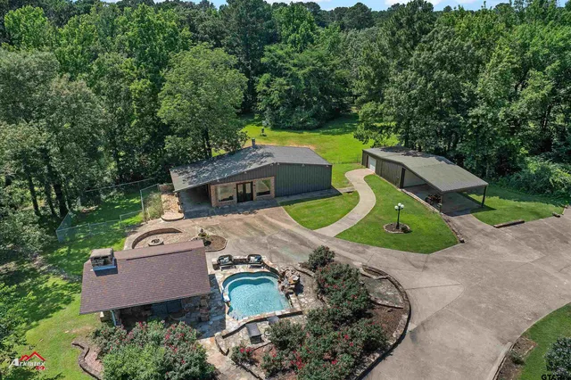 an aerial view of a house with a garden