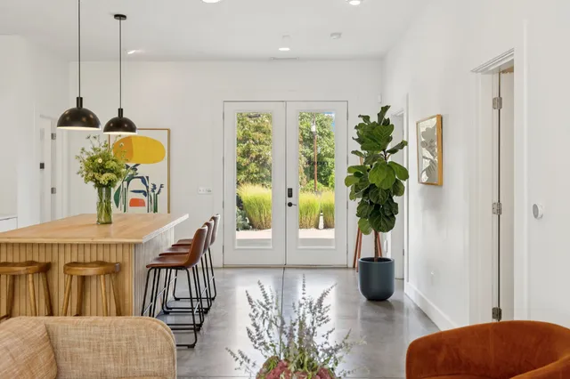 a bathroom with a sink toilet tub and shower