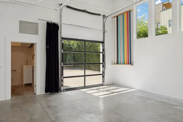 a view of a backyard with sitting area and furniture