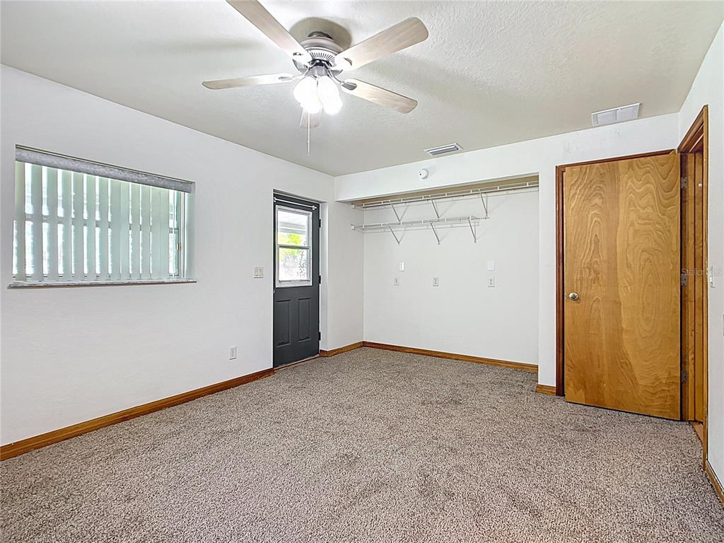 295 Locust Pass Ocala, FL 34472 - Photo 18 of 62 a view of an empty room with a window