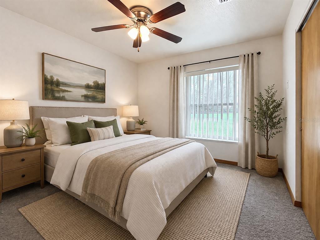 295 Locust Pass Ocala, FL 34472 - Photo 29 of 62 a bedroom with bed and window