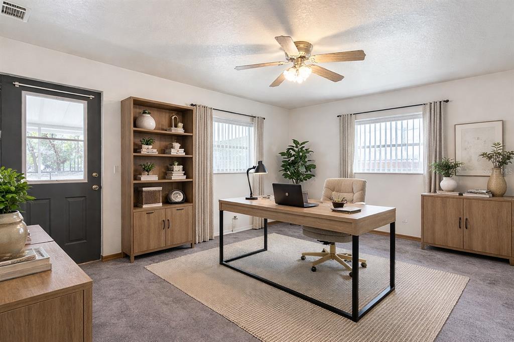 295 Locust Pass Ocala, FL 34472 - Photo 35 of 62 a view of a workspace with furniture and a window