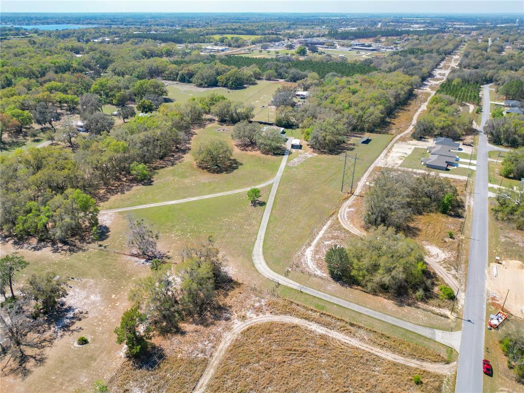 295 Locust Pass Ocala, FL 34472 - Photo 62 of 62 an aerial view of a house with a yard