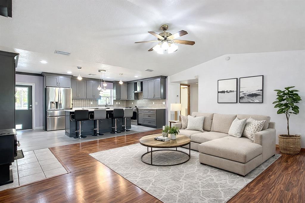 295 Locust Pass Ocala, FL 34472 - Photo 8 of 62 a living room with furniture and kitchen view