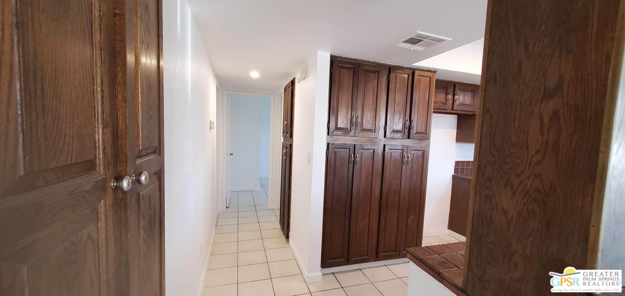 66565 12th Street, Unit 1 Desert Hot Springs, CA 92240 - Photo 7 of 10 a bathroom with a mirror
