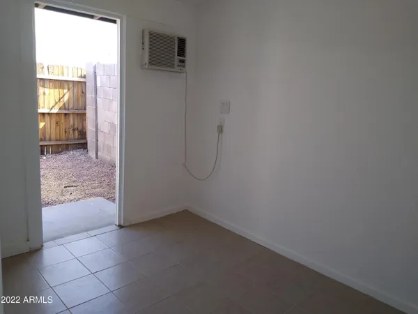 a view of wooden door and outdoor space