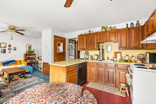 a very nice looking kitchen with a large window