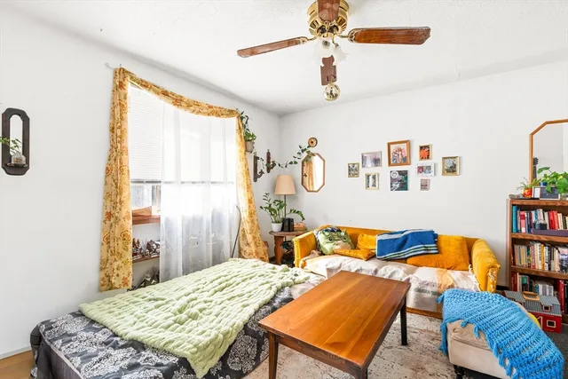 a bedroom with furniture and a bed