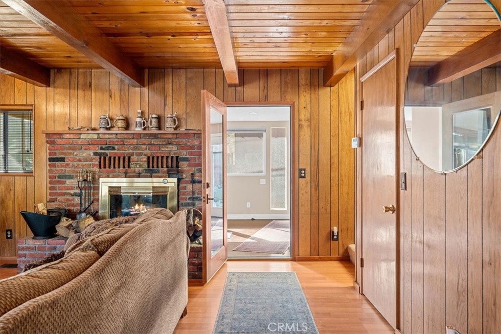 1631 Linnet Road Wrightwood, CA 92397 - Photo 18 of 42 a view of a living room filled with furniture
