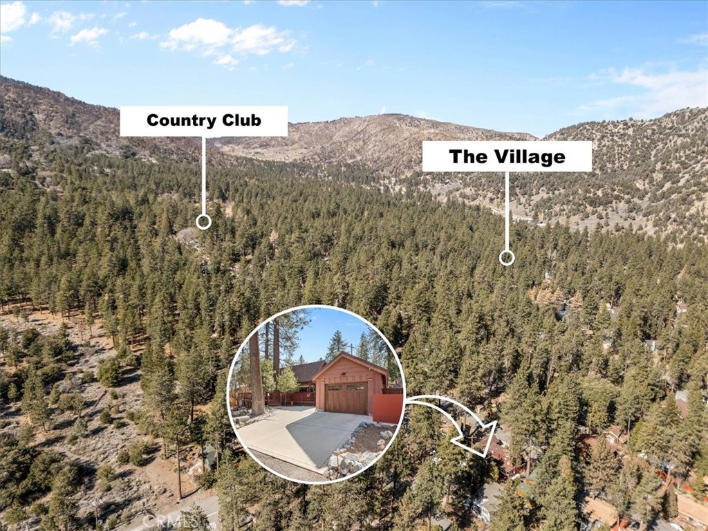 1631 Linnet Road Wrightwood, CA 92397 - Photo 2 of 42 a view of a wooden wall with a view of roof