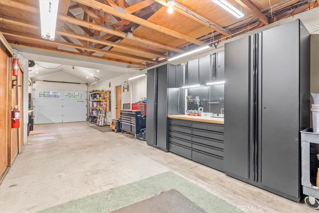 1631 Linnet Road Wrightwood, CA 92397 - Photo 34 of 42 a view of a hallway with wooden walls