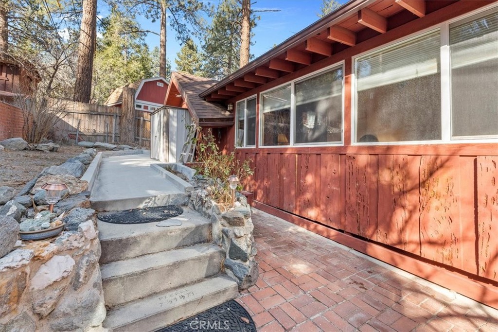 1631 Linnet Road Wrightwood, CA 92397 - Photo 38 of 42 a front view of a house with a yard