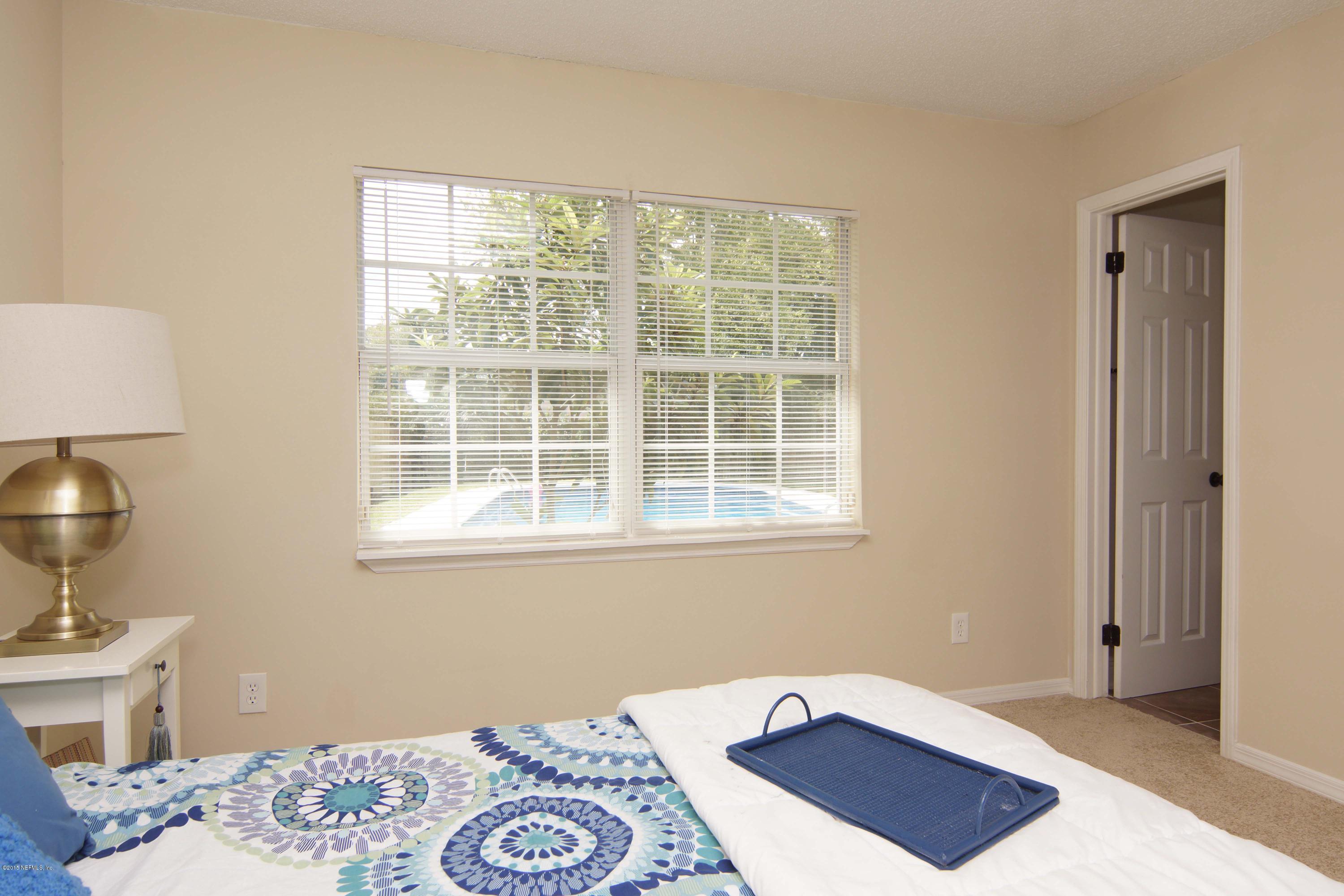 3940 Morning Glory Road Jacksonville, FL 32210 - Photo 15 of 25 Master bedroom view of pool